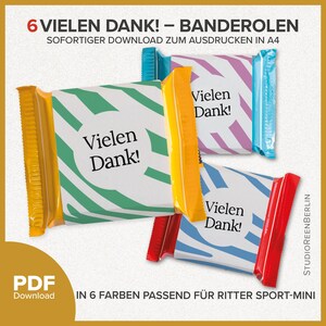 Peut inclure: Six modèles de bannières de remerciement imprimables dans différentes couleurs, notamment jaune, vert, bleu, rose et rouge. Les bannières présentent un motif rayé et le texte "Vielen Dank!" qui se traduit par "Merci !" en français. Les bannières sont conçues pour s'adapter aux barres de chocolat Ritter Sport-Mini.