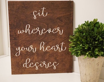 Sit wherever your heart desires wedding decor. Rustic wedding decor. Wedding prop sign.