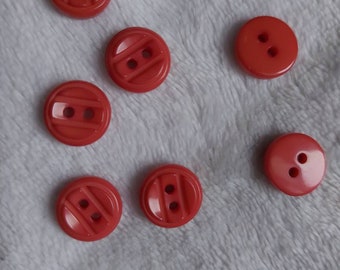 Button Ø10 mm Lot of 7 units. Round, pink orange color. For shirts and blouses. Various models and lotsotes