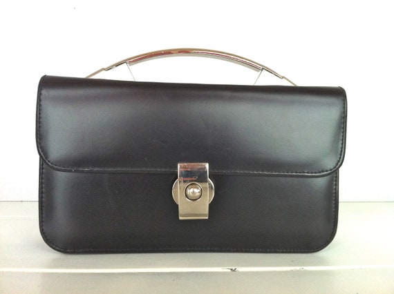 black clutch bag with handle
