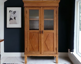 Antique cabinet with shelving, fluted glass and blackened bronze hardware