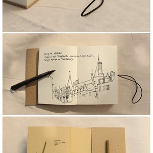 May include: A brown leather bound journal with a black string closure. The journal is open to a page with a black and white ink drawing of a building. The text on the page reads "D NEVERS Vafen an cole pic... ve bu palaisdical Super Sampon "GANDRINS."