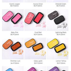 May include: Ten ink pads with floral designs and the text "Not older just better". The ink pads are in various colors, including cosmic copper, aurora silver, emerald green, baby pink, coral red, lightning black, shimmer rust, galaxy gold, lemon yellow, sky blue, pearl violet, and violet. Each ink pad measures 96 x 50 mm.