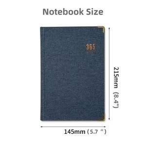 May include: A blue notebook with a gold trim and the text "365 Days" on the front. The notebook measures 5.7 inches by 8.4 inches.