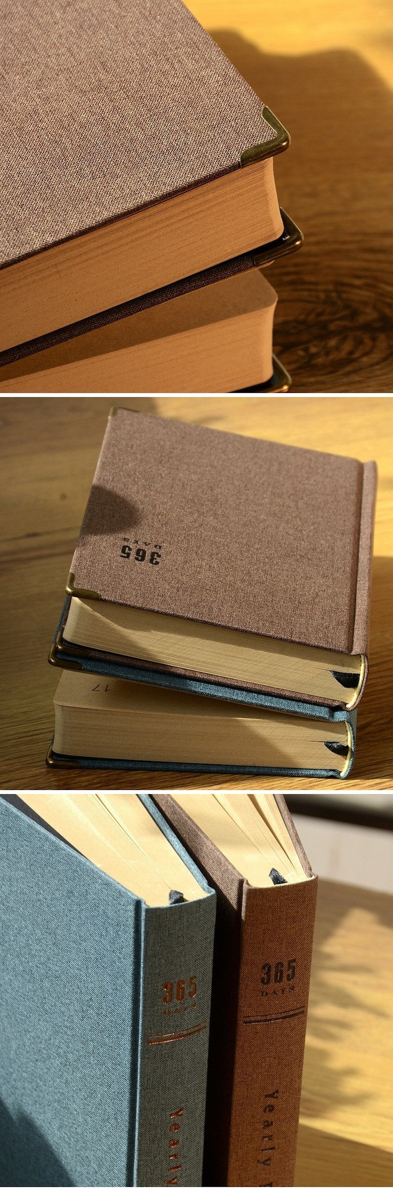 May include: Three hardcover journals with brown, blue, and brown covers. The covers are textured and have gold corner accents. The journals are stacked on top of each other. The top journal has the text "365 DAYS" printed on the cover. The middle journal has the text "365 DAYS" printed on the cover. The bottom journal has the text "365 DAYS" printed on the cover.