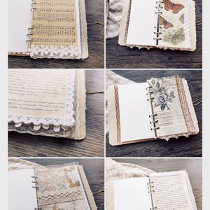 May include: A collection of six different pages from a handmade journal. Each page features a different design, including music notes, butterflies, flowers, and maps. The pages are decorated with lace and ribbon.