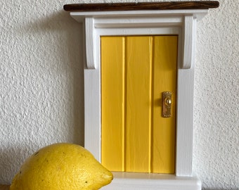 Yellow Fairy Door with roof