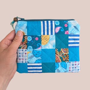 Turquoise patchwork cotton makeup pouch, handmade quilted patina blue zipped cosmetic bag