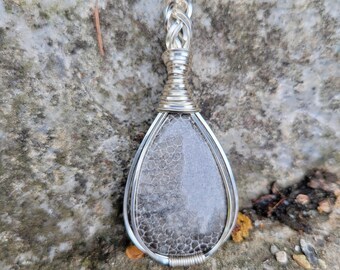 Black Fossil Coral pendant wire wrapped in non-tarnish silver