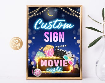 May include: A printable sign with a blue background and neon pink and blue text that says "Custom Sign Movie Night". The sign features a movie clapperboard, popcorn, and film reels.