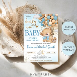 Flat lay of the printed baby shower invite next to dry pampas grass and modern boho decor elements.
