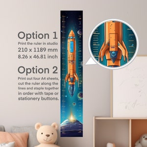 May include: A colorful rocket ship height chart with a blue, black, and orange color scheme. The chart is printed on a white background and includes a ruler with measurements in inches and centimeters. The chart is designed to be printed in studio or cut out and assembled from four A4 sheets.