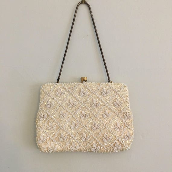 cream satin clutch bag