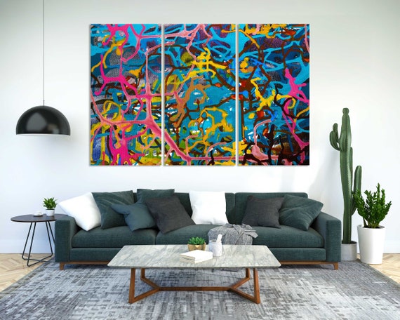 キャンバスに描かれたカラフルなアクリル絵の具の飛沫、家のための