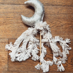 silver sequin moon wand with shaggy tassels