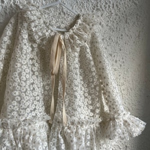 White embroidered daisy sheer jacket image 1