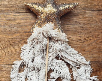 gold sequin wand with shaggy tassels