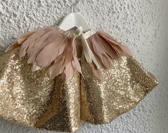 Gold sequin cape with goose feathers
