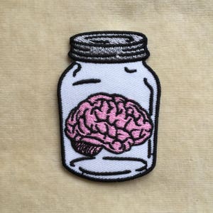 Brain In The Jar Iron On Patch