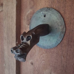 Steel dragon head. Blacksmith hand forged sculpture