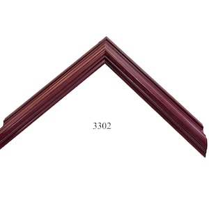 May include: A close-up of a dark red wood picture frame with a beveled edge. The frame is in the shape of a right angle and has a number "3302" printed on it.