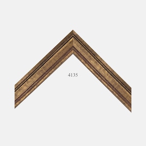 May include: An L-shaped corner section of a picture frame featuring a distressed antique gold finish with dark brown undertones and a multi-tiered stepped profile. The number 4135 is printed in black text in the center of the frame corner.