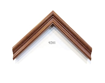 May include: A corner section of a picture frame molding with a medium brown wood grain finish. The profile features a stepped, tiered design with rounded edges and a smooth surface. The number 9201 is printed in black text in the center area.