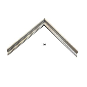 May include: A silver-toned picture frame corner sample featuring a multi-tiered, stepped profile with a metallic finish. The frame section is angled to form a V-shape and is clearly marked with the black printed number 146 in the center.