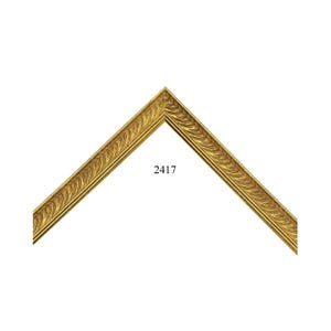 May include: A gold-colored picture frame corner sample featuring a textured, repeating wave-like pattern along its length. The frame is angled to form a point at the top, and the number 2417 is printed in black text in the center of the open space.