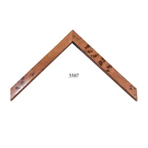 May include: A wooden picture frame corner in a V-shape. The frame has a warm, reddish-brown color with a natural wood grain pattern. The number "3507" is printed on the frame.