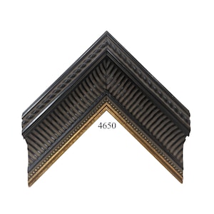 May include: A black and gold picture frame with a rope design on the outer edge and a fluted design on the inner edge. The frame is labeled with the number 4650.