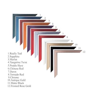 May include: A collection of twelve L-shaped picture frame corner samples arranged in a cascading diagonal pattern. Each frame features a unique color: Really Teal, Sapphire, Merlot, Tangerine Twist, Purple Haze, Chinese Red, Dawn, Tornado Red, Chrome, Antique Gold, Matte Black, and Frosted Rose Gold, labeled 1 through 12.