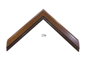 May include: A V-shaped corner section of a picture frame featuring a medium brown wood grain finish with a smooth, polished surface. The frame profile includes a subtle inner ridge detail. The number 270 is printed in black in the center.