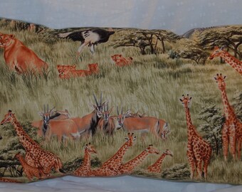 May include: A colorful throw pillow with a safari theme featuring giraffes, lions, zebras, and other animals in a green grassy landscape.