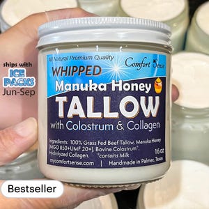 May include: A jar of whipped Manuka honey tallow with colostrum and collagen. The label includes the text "All Natural Premium Quality" and "Comfort Sense." The jar is 16 oz and the text "Bestseller" is also visible.