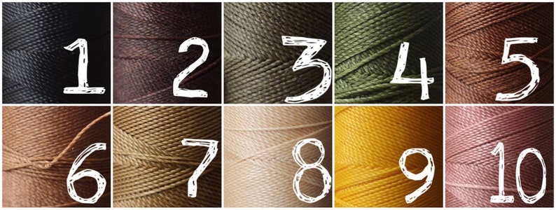 May include: Ten spools of thread in various colors, numbered 1 through 10. The colors are black, brown, green, yellow, and pink.