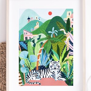 May include: A framed illustration of a white tiger lying in a lush green jungle with a red sun in the background. The jungle is filled with palm trees, vines, and other tropical plants. The tiger is looking directly at the viewer.