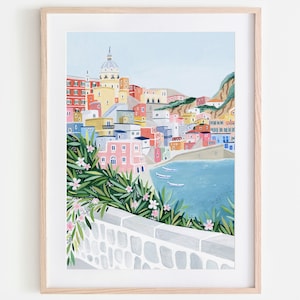 May include: A colorful illustration of a seaside town with a church steeple, buildings, and a blue bay with boats. The scene is viewed from a stone wall with green foliage and pink flowers.