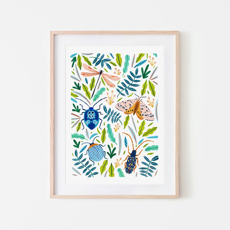 May include: A framed print with a white background featuring a colorful pattern of insects and leaves. The insects include a dragonfly, a moth, and two beetles. The leaves are green and blue.