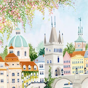 May include: A watercolor painting of a European city with a bridge, buildings, and a clock tower. The buildings are painted in shades of pink, yellow, and white. The sky is a light blue with white clouds. There are trees and flowers in the foreground.