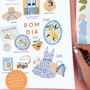 May include: An illustrated print featuring Portuguese themes. Includes images of a guitar, plates of food, a dress, a camera, and the words "BOM DIA". The print is signed by Amber Davenport.