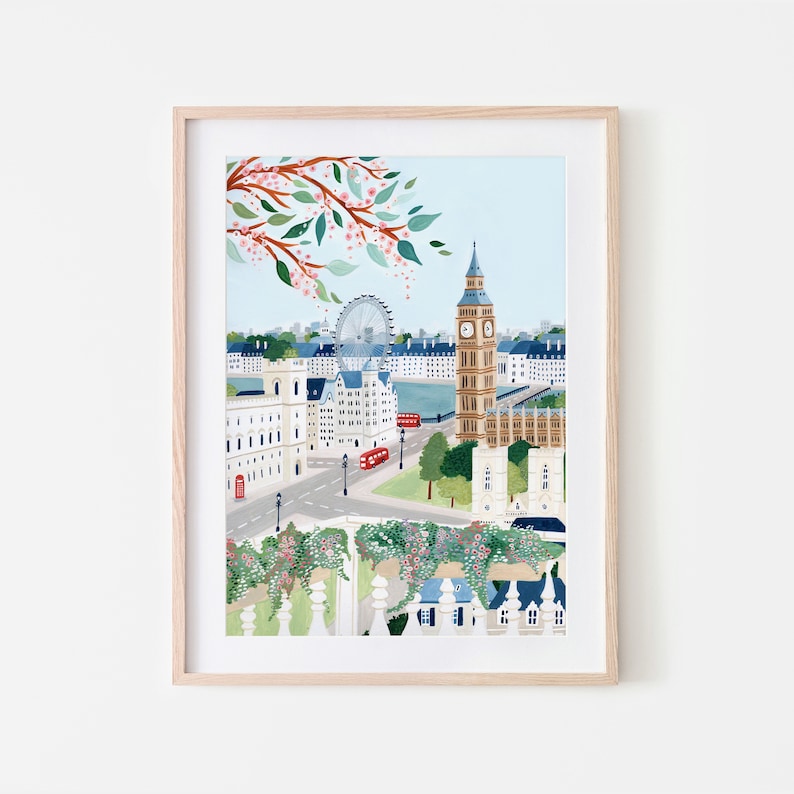 May include: A colorful illustration of the London skyline featuring Big Ben, the London Eye, and a red double-decker bus. The scene is framed by a blooming tree with pink flowers.
