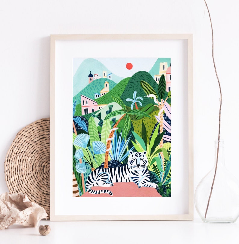 May include: A framed illustration of a white tiger lying in a lush green jungle with a red sun in the background. The jungle is filled with palm trees, vines, and other tropical plants. The tiger is looking directly at the viewer.