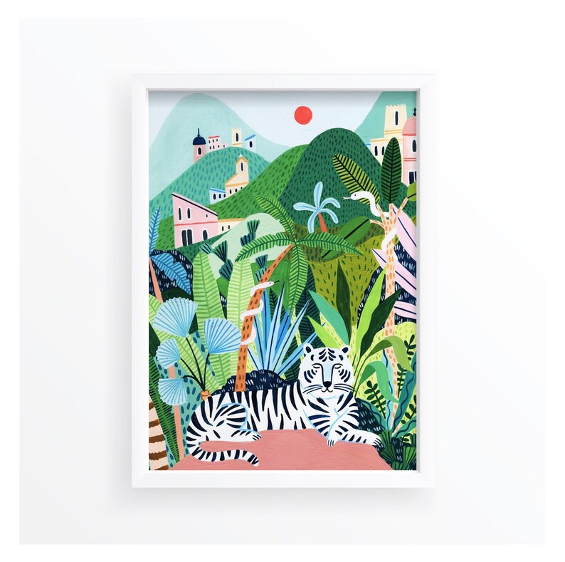 May include: A white tiger with black stripes is lying down in a lush green jungle setting. The tiger is surrounded by palm trees, ferns, and other tropical plants. There are pink and white buildings in the background, and a red sun is visible in the sky.