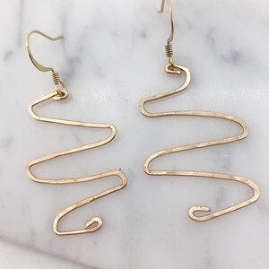 HIGH VOLUME EARRING, gold squiggle drop earrings