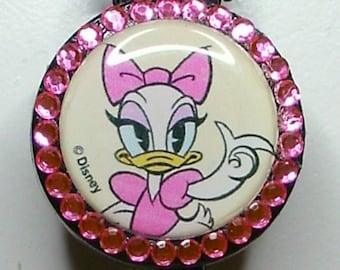 Carrete de insignia Disney "Daisy Duck" con pedrería rosa