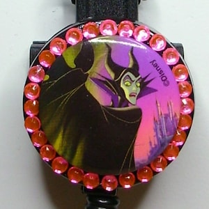 Maleficent badge reel with neon pink rhinestones