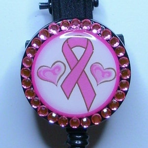 Assorted Breast Cancer Awareness badge reels with pink rhinestones