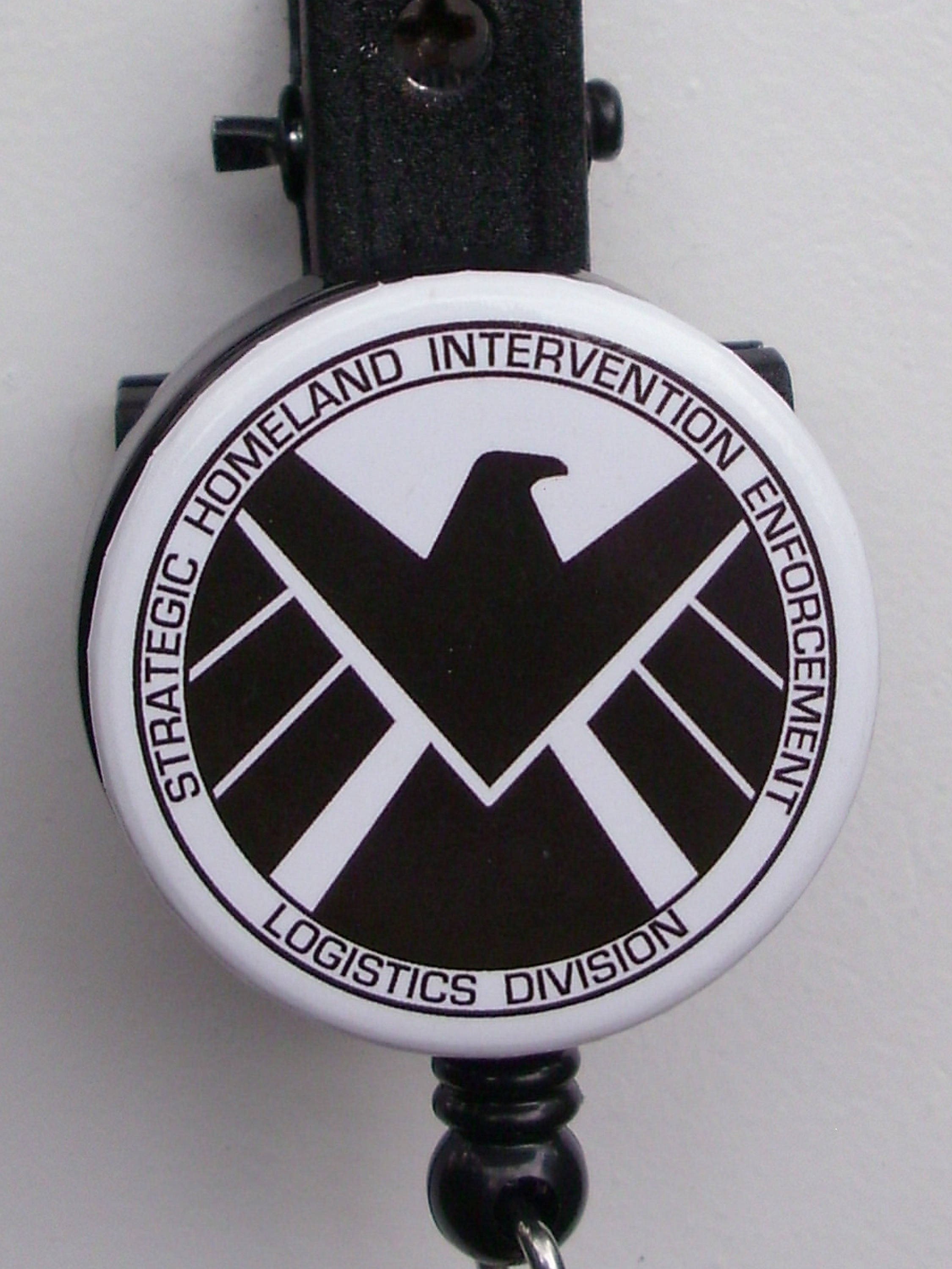 Marvel "S.H.I.E.L.D." worded logo badge reel