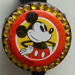 Vintage Mickey badge reel with yellow rhinestones